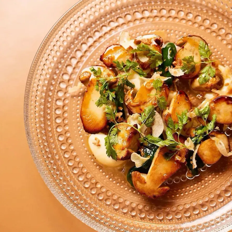 The photos are portrating the dishes of the september menu of Le Dali. The dishes are made with autumn ingredients: mushrooms, poultry, and beets.