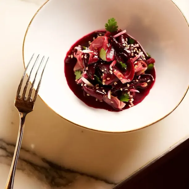 The photos are portrating the dishes of the september menu of Le Dali. The dishes are made with autumn ingredients: mushrooms, poultry, and beets.