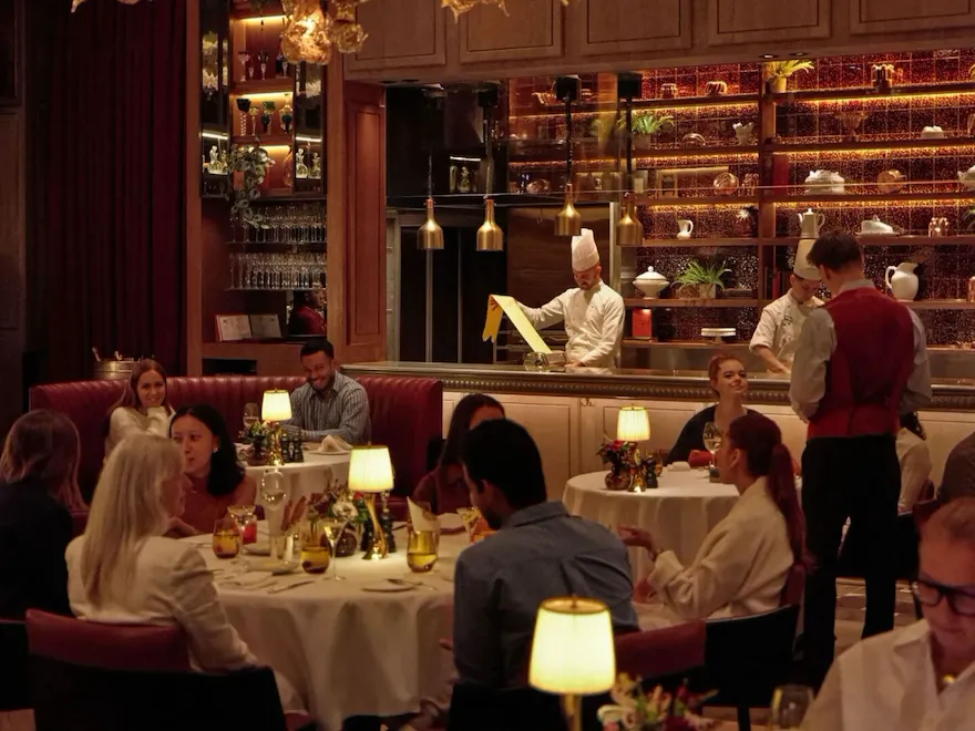 The Grill at The Dorchester interior image with models dining