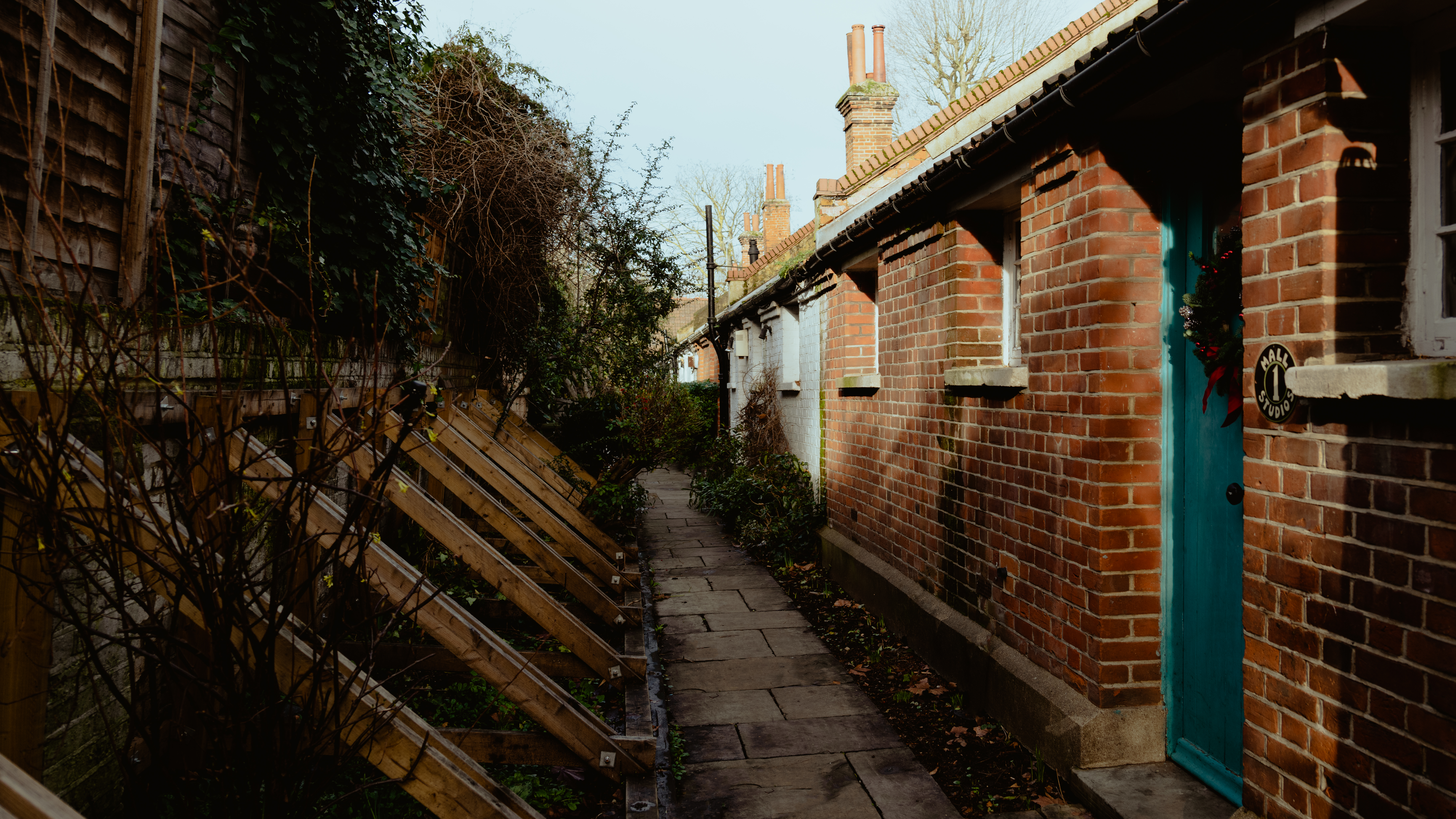 Narrow lane with brick studios in Hampstead 