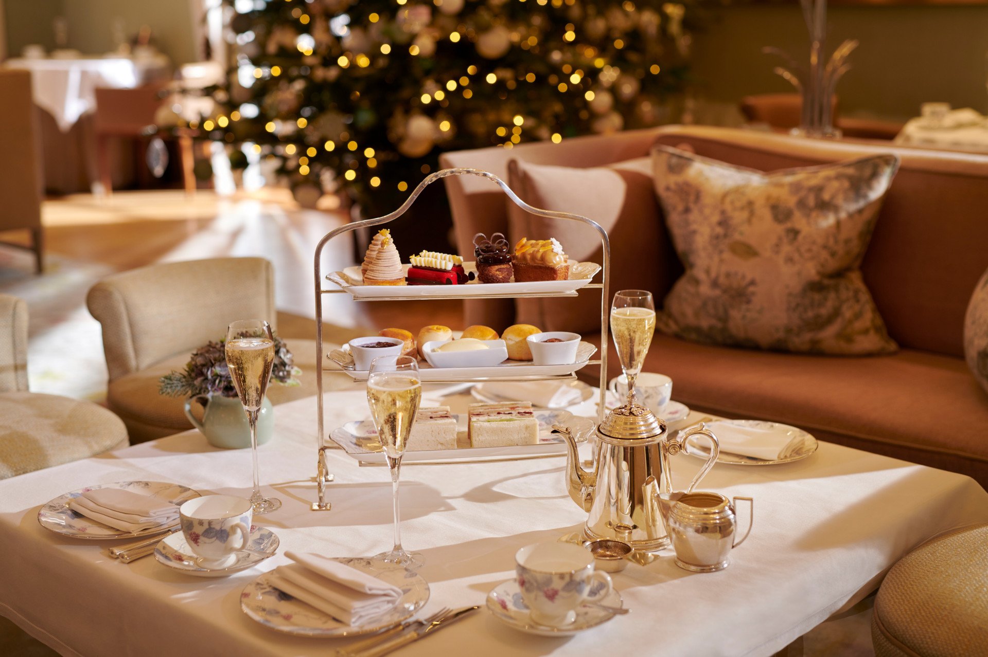 Festive afternoon tea in the Drawing room at Coworth Park. 