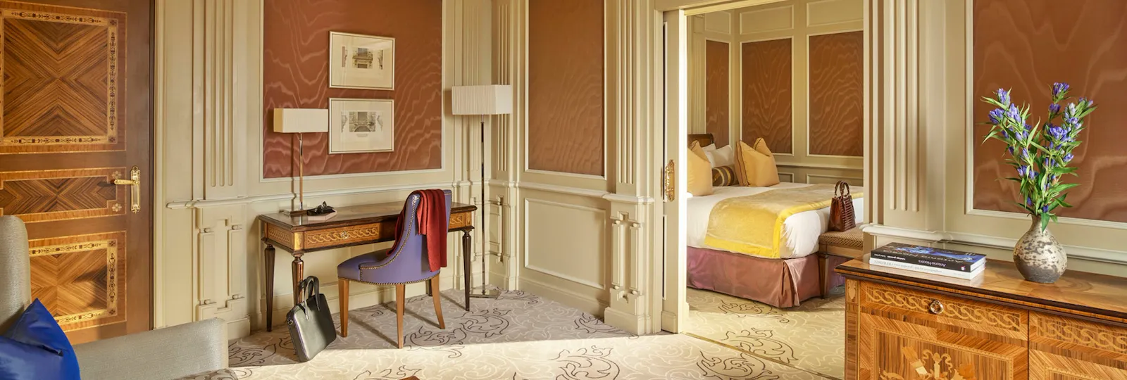 Ambassador Suite Living Room showing the study corner and a small glimpse of the bedroom