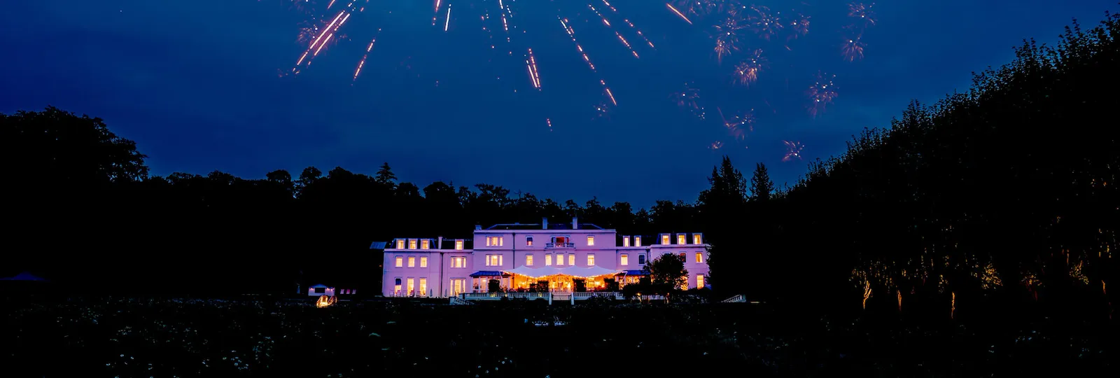 Night time exterior image of the Mansion House