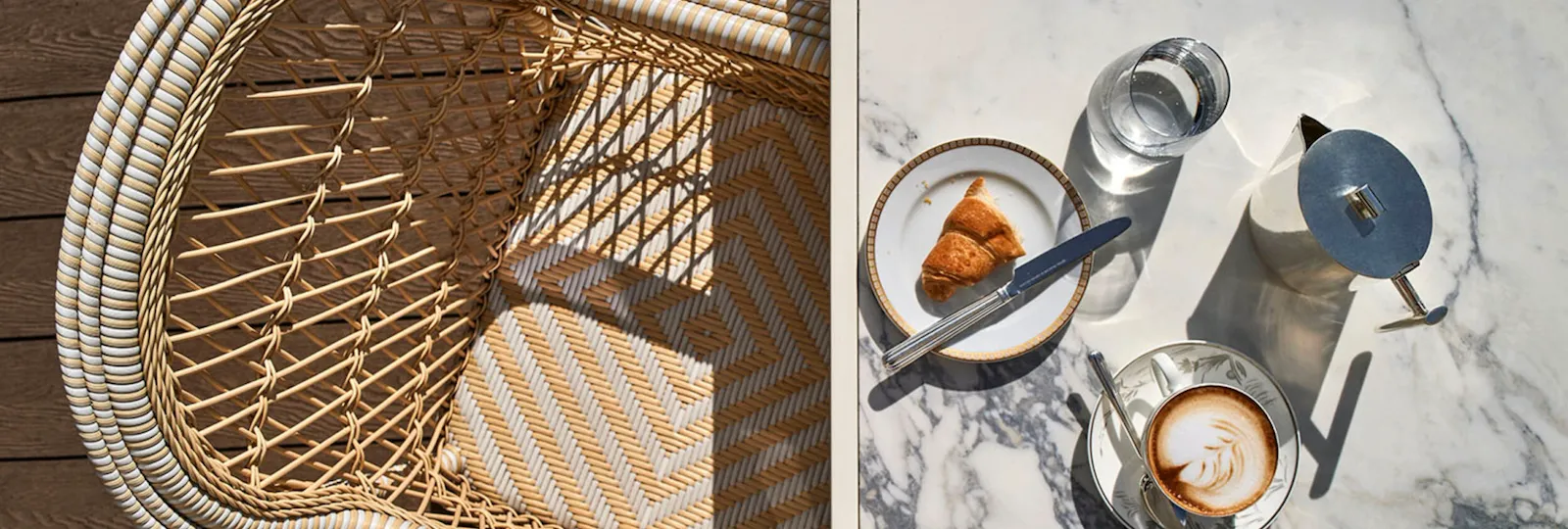 vista dall'alto di un tavolo in marmo apparecchiato per colazione con caffè e brioches