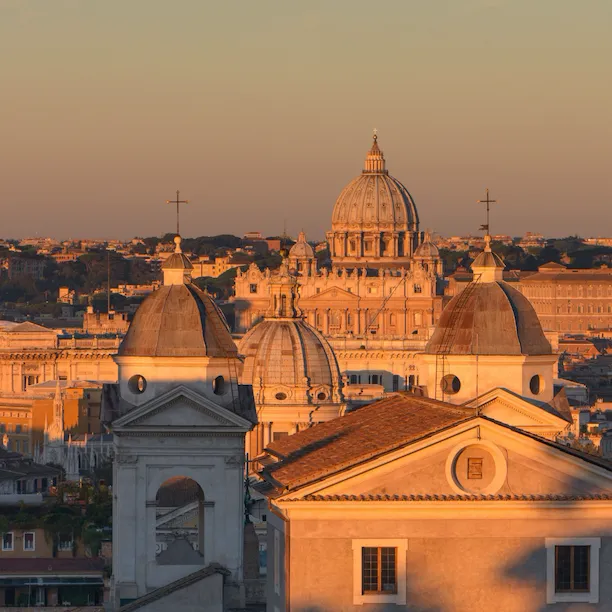 Sunset view of Rome and St Peter's Basilica