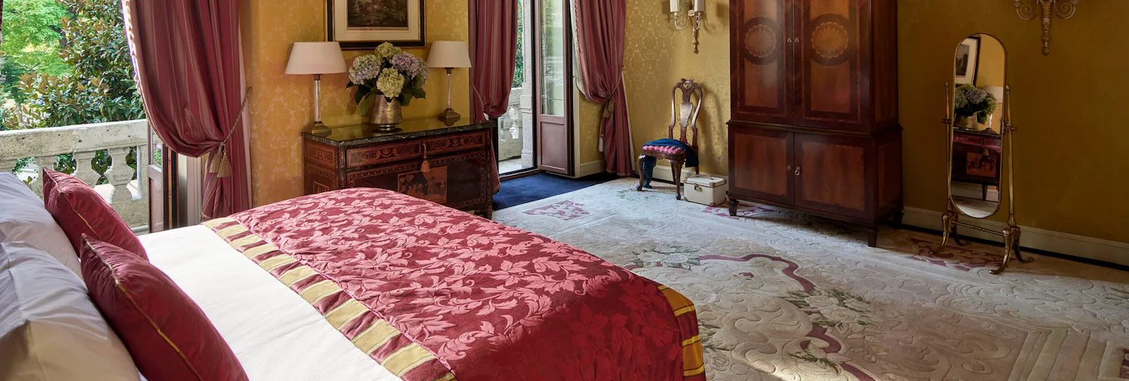 Royal Suite Bedroom revealing the majestic chandelier hanging from the ceiling