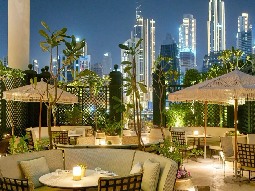 Image of Veranda design and food at The Lana - Dorchester Collection