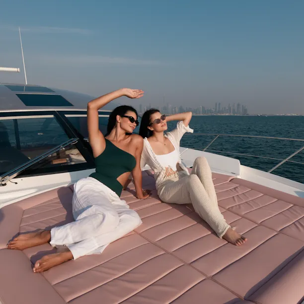 Two ladies enjoying the sun in the Lana boat