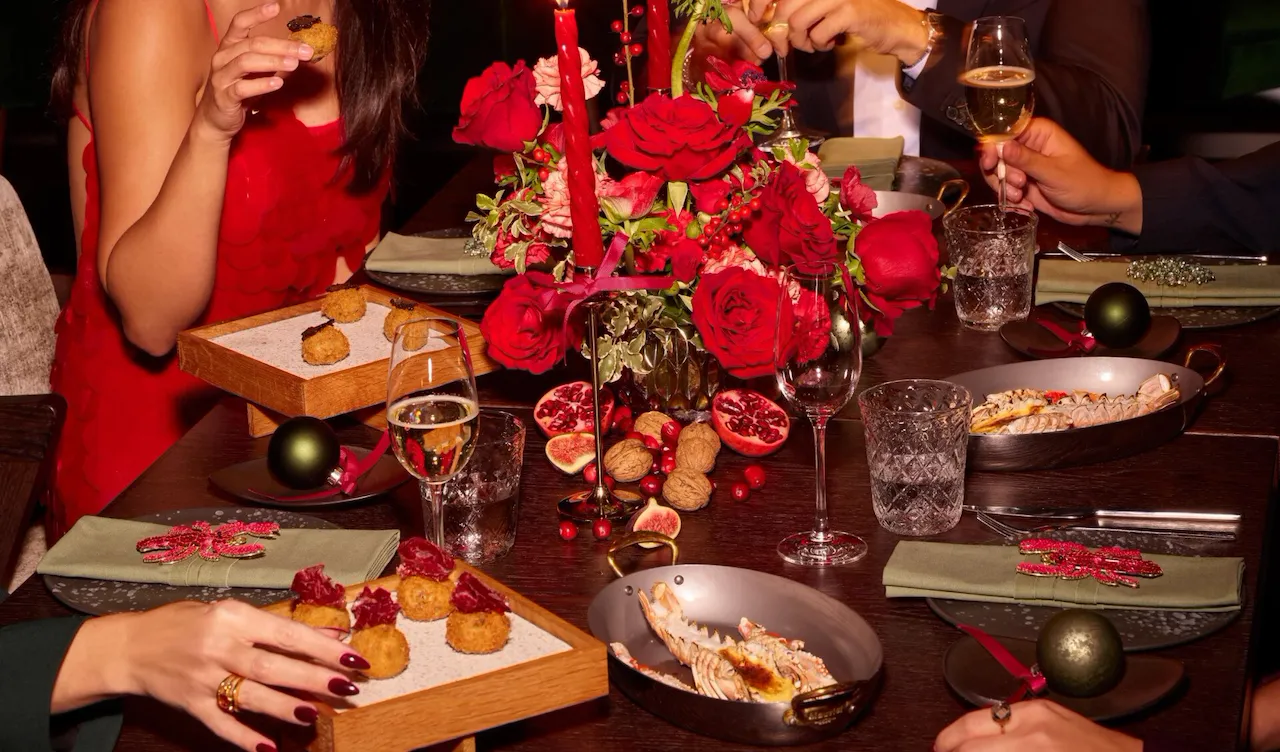 A group of friends having dinner in Jara