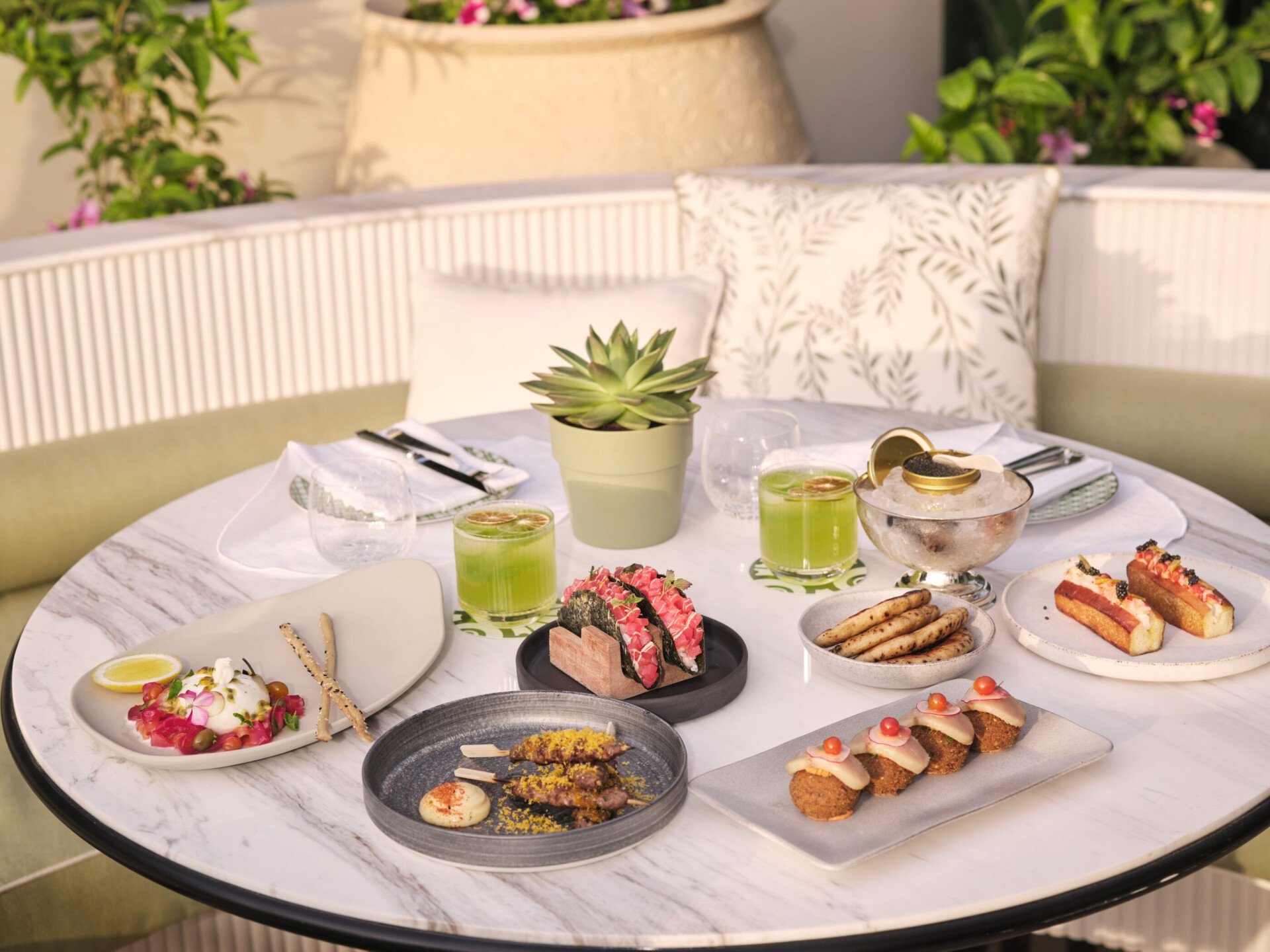 Image of Veranda design and food at The Lana - Dorchester Collection