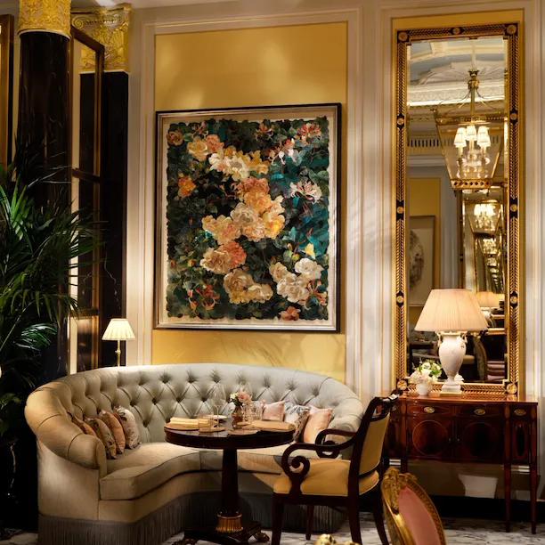 The Promenade at the Dorchester artwork and set up for afternon tea