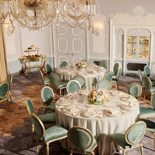 The Orchid set up for a stylish private dinner - three large tables beautifully set