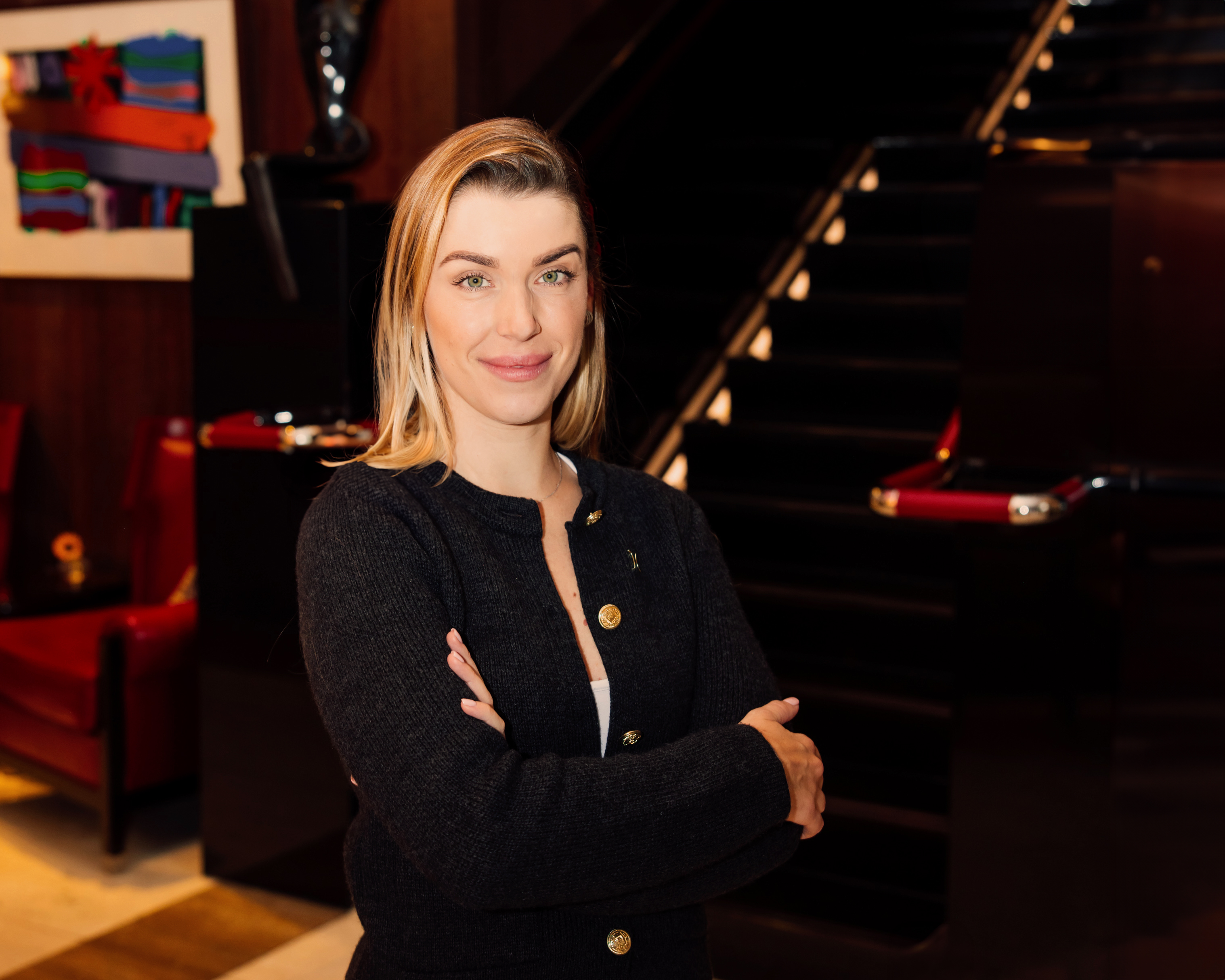 Staff photo of Veronika standing in lobby
