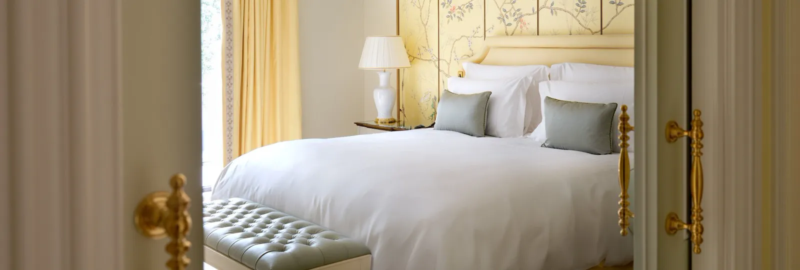 A light and airy bedroom with elegant decorative touches