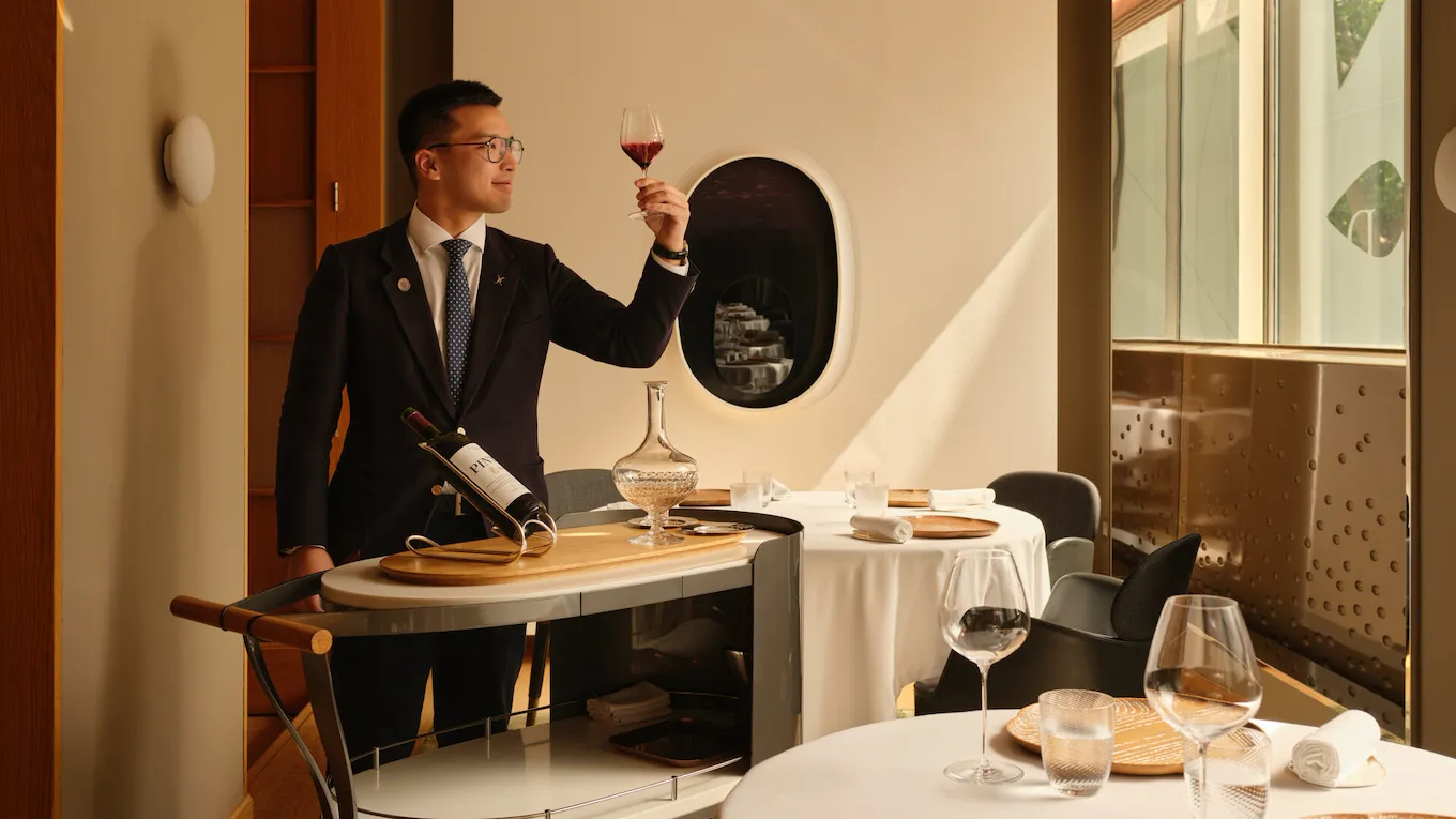 Wine service lifestyle moment at Alain Ducasse at The Dorchester
