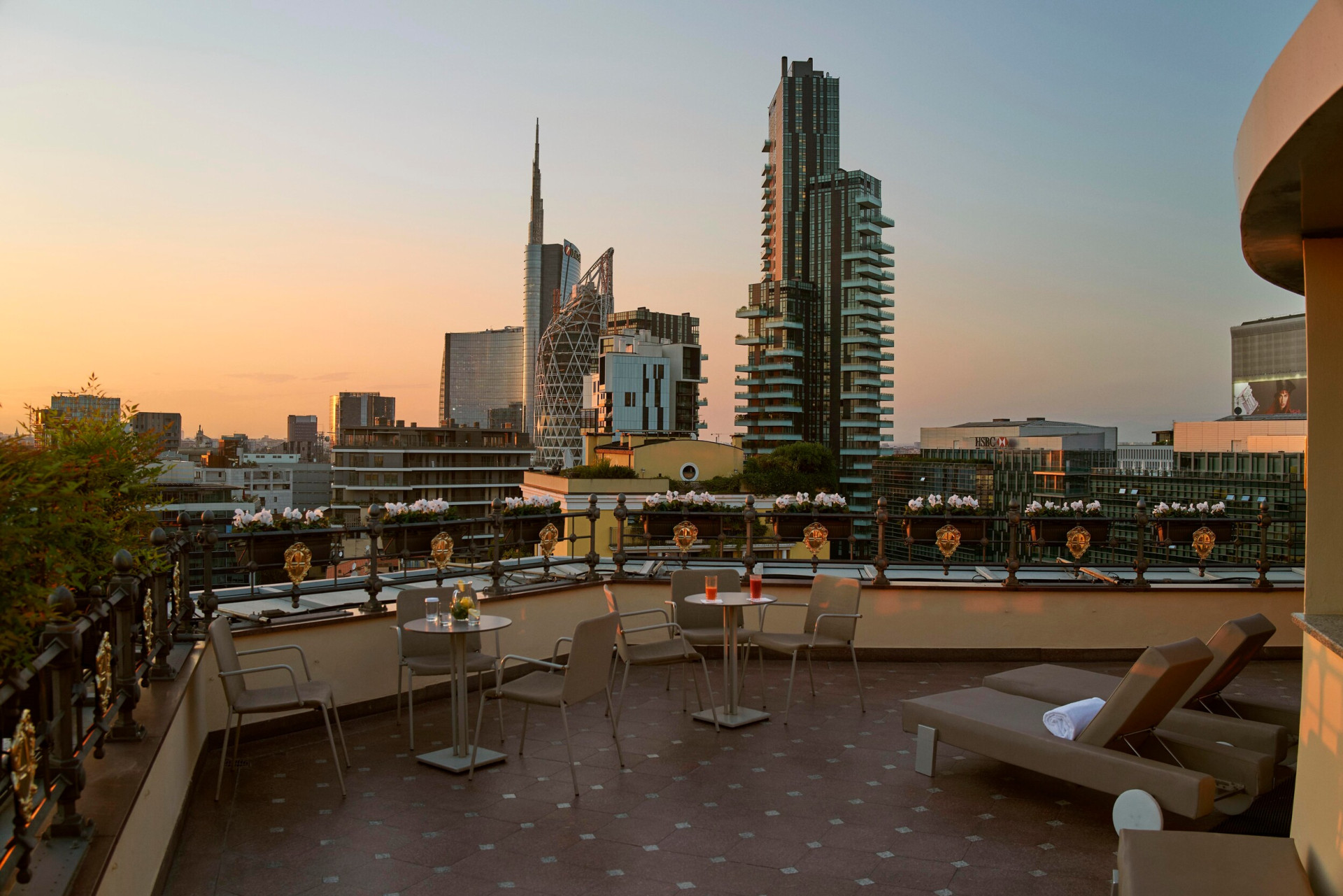 Club 10 terrace at sunset with Porta Nuova skyline in the background