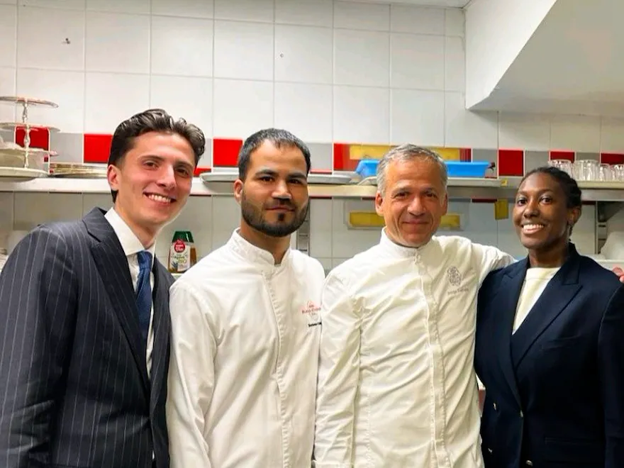4 members of Plaza Athénée team standing next to each others