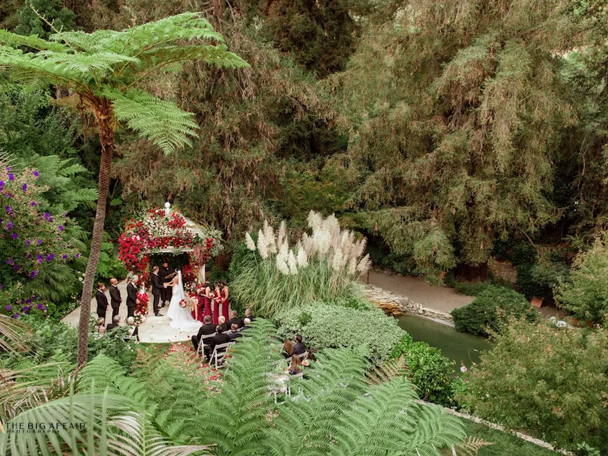 Aerial view of wedding ceremony at Swan Lake, Hotel Bel-Air in Los Angeles
