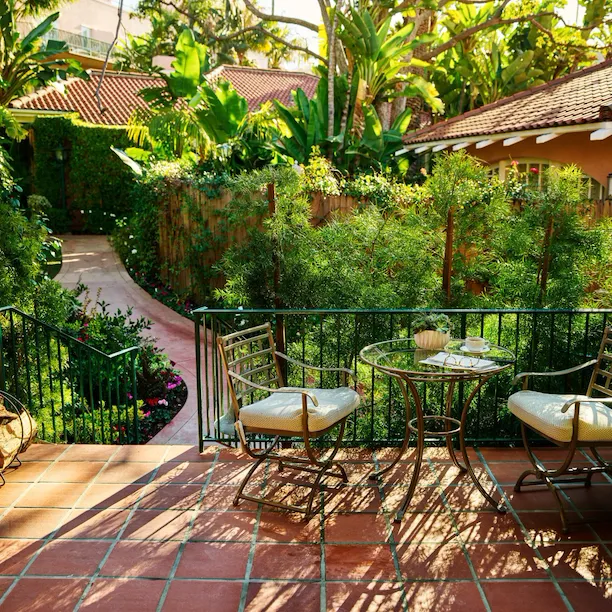 Bungalow Room Patio with glasses, script and coffee