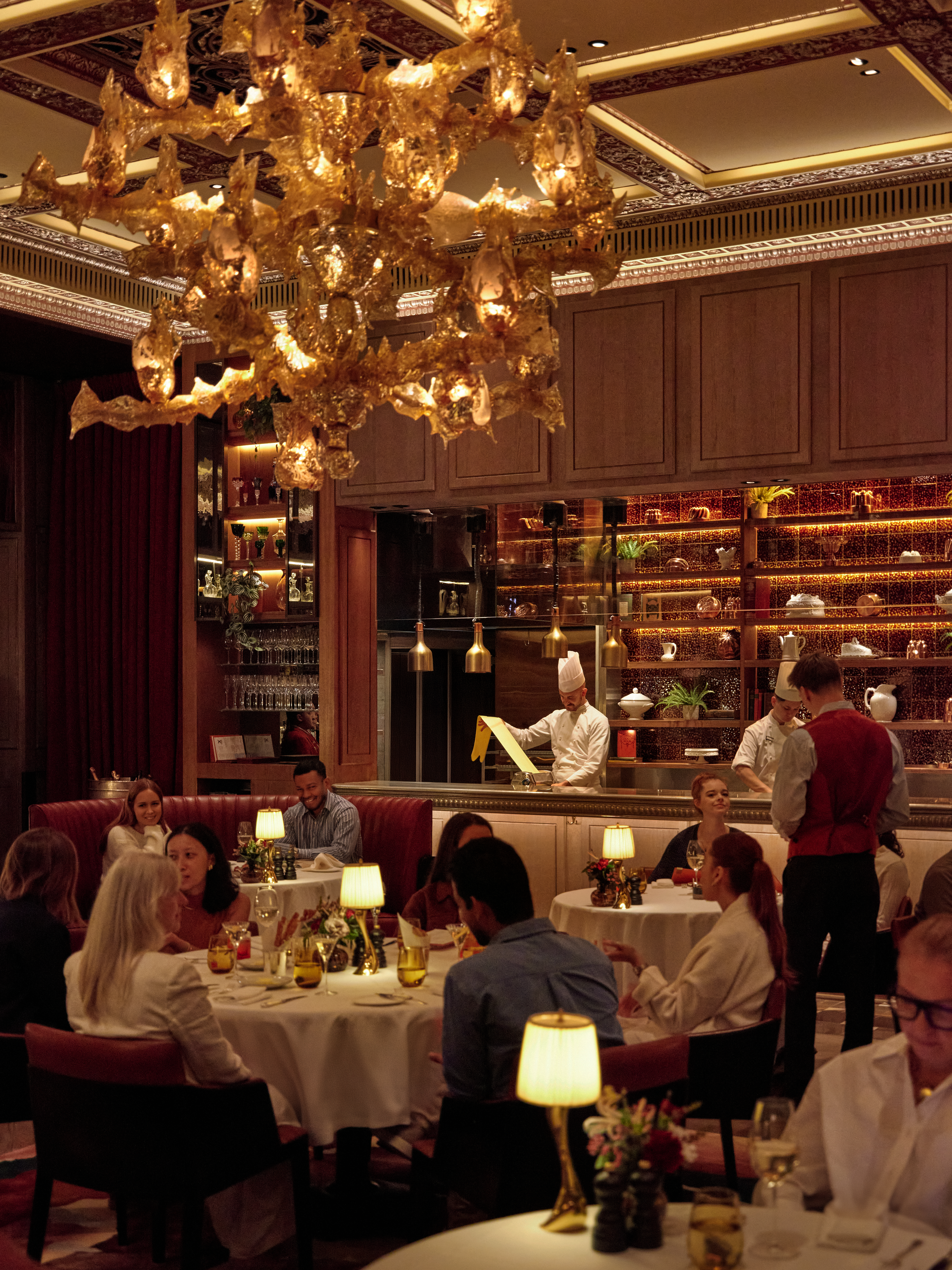 Warm, lively atmosphere in The Grill at The Dorchester for evening dinner
