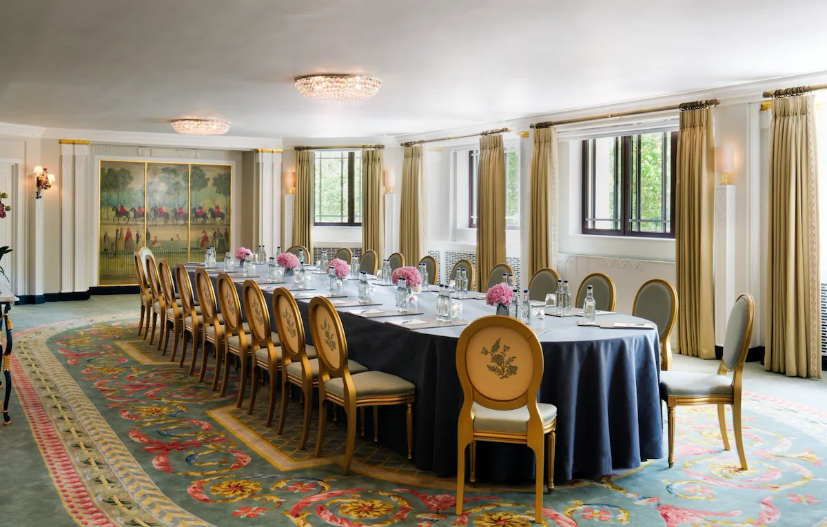 Park Suite Left at The Dorchester set for a meeting or conference with water and stationary on the table
