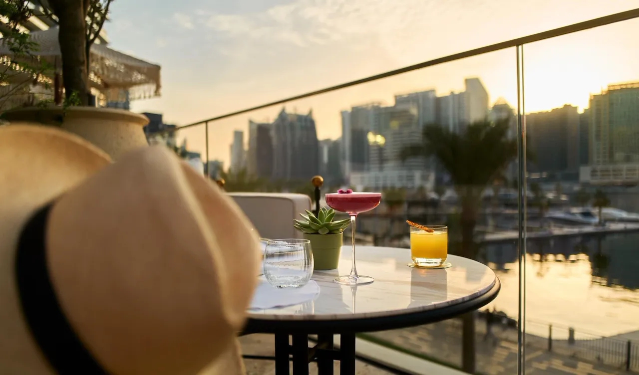 Image of Veranda design and food at The Lana - Dorchester Collection