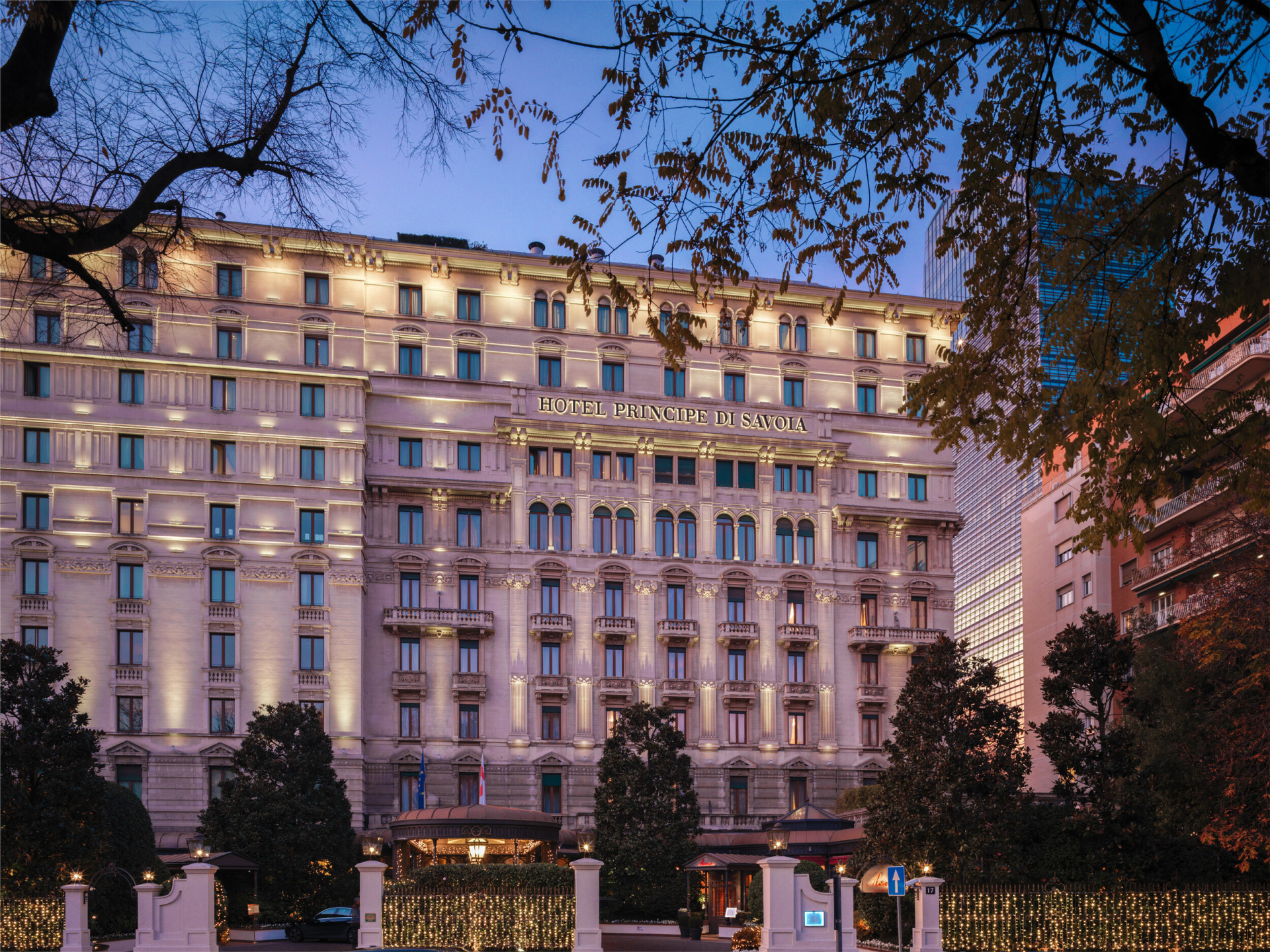 Hotel Principe di Savoia exterior with lights by night