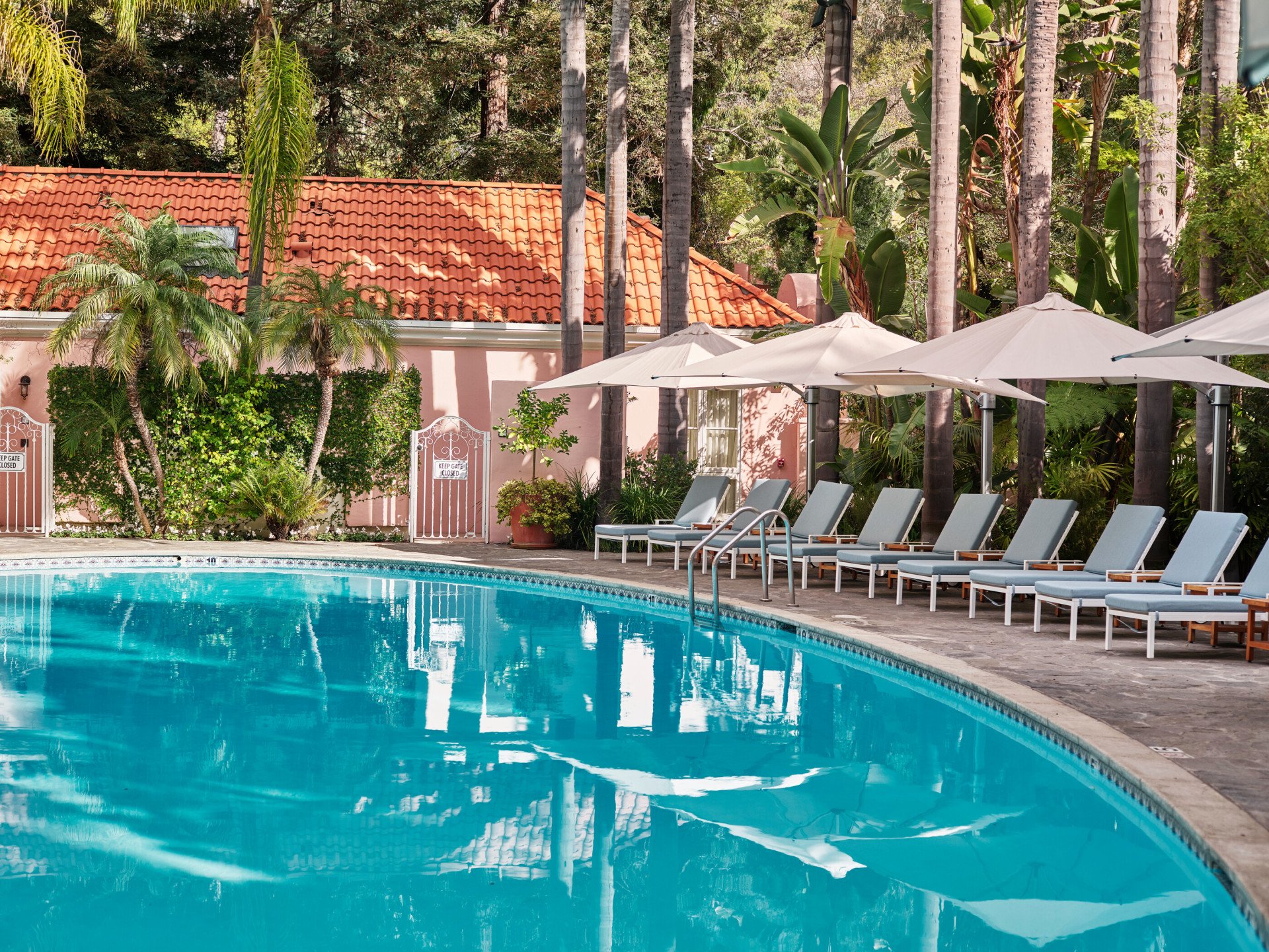 Pool with lounge chairs at Hotel Bel-Air
