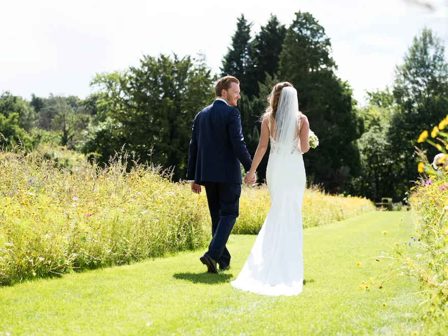 Coworth Park-Weddings-Meadow couple-Credit Fiona Kelly