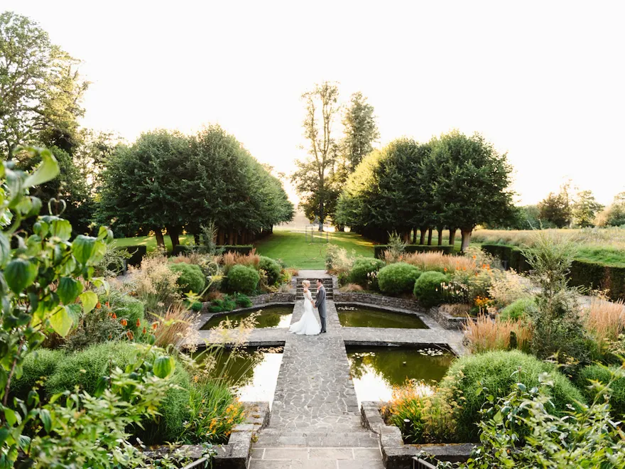Coworth Park-Weddings-Sunken Gardencouple-Credit Fiona Kelly