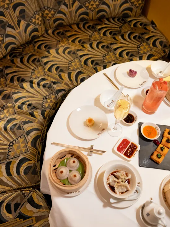 Birds eye view of table with dumplings and cantonese food at China Tang.