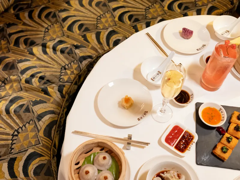 Birds eye view of table with dumplings and cantonese food at China Tang.