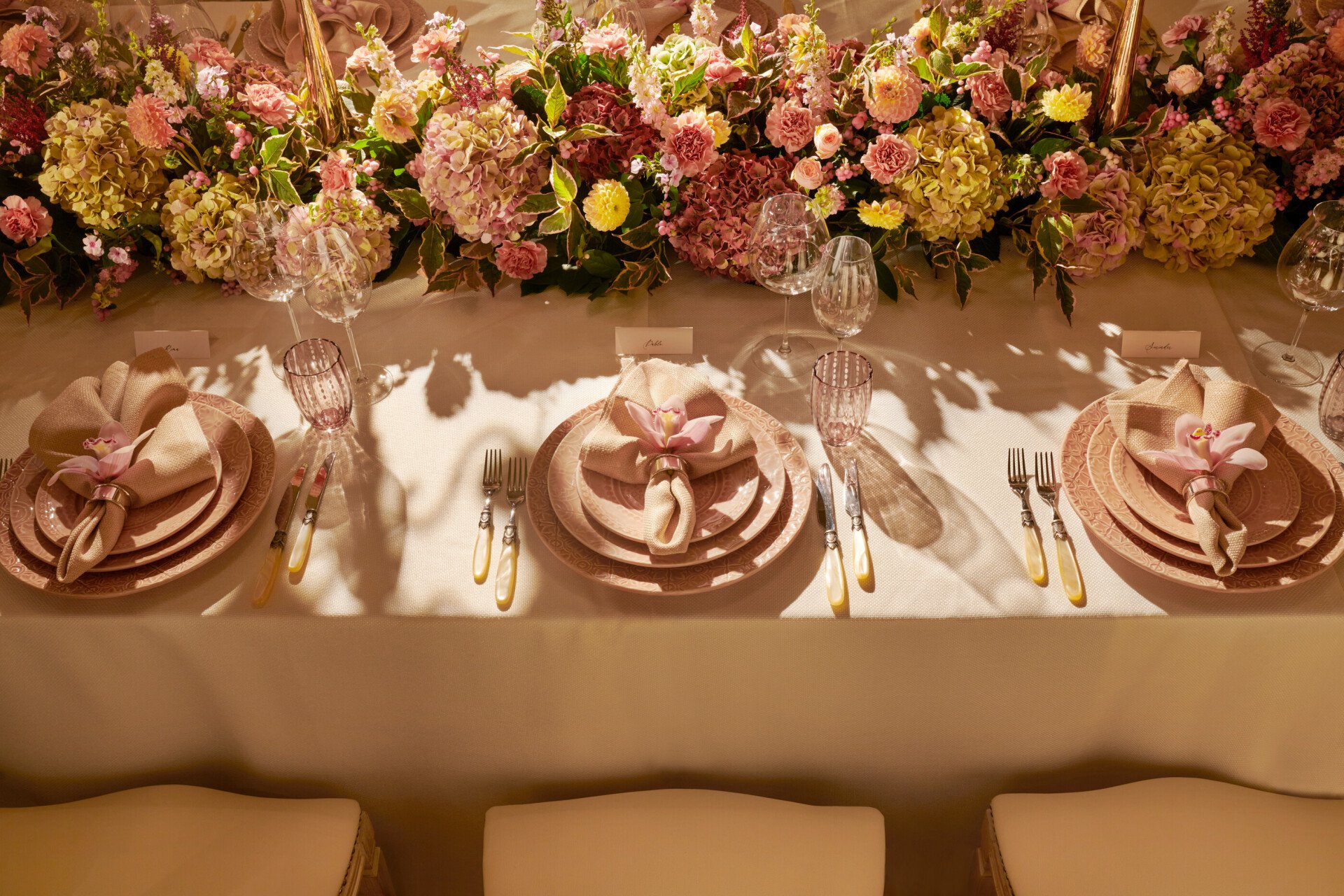 The Dorchester Gold and Silver event space set of  fabulous evening event with a stunning floral centre perice