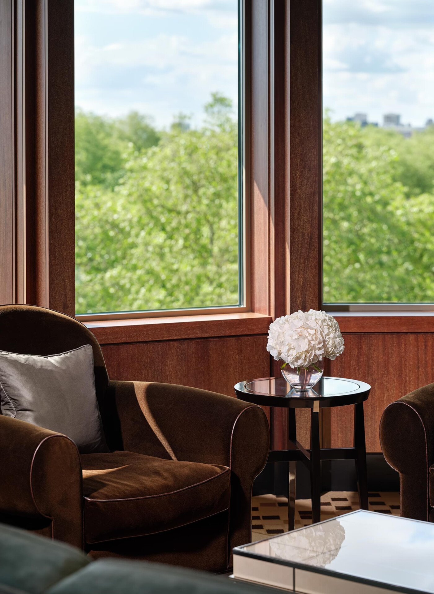 Park Lane Suite at 45 Park Lane smaller coffee table in sitting area with park views in the background