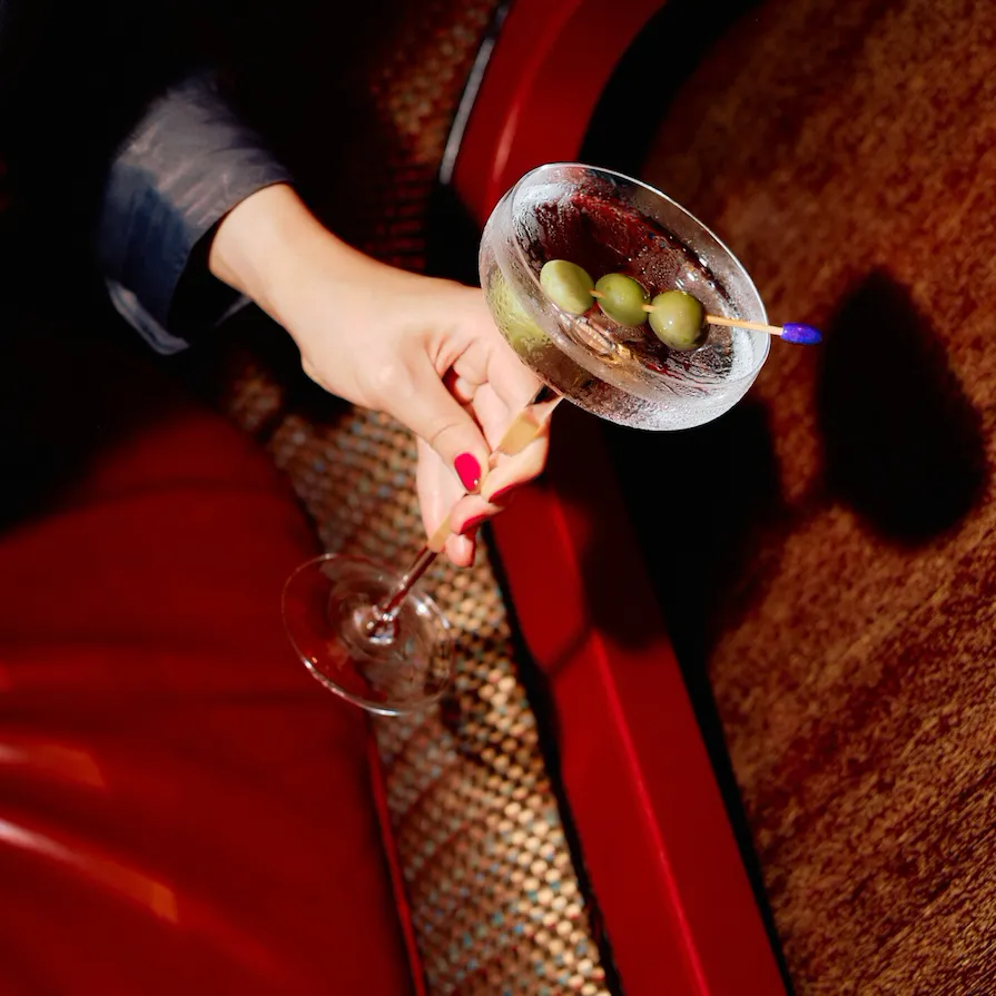 Woman looking out window of Park Lane Studio