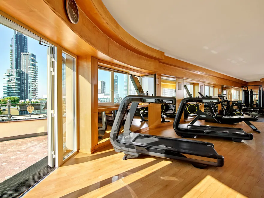 Club10 Fitness & Beauty Center Gym area with a beautiful daylight and a view on Porta Nuova skyline