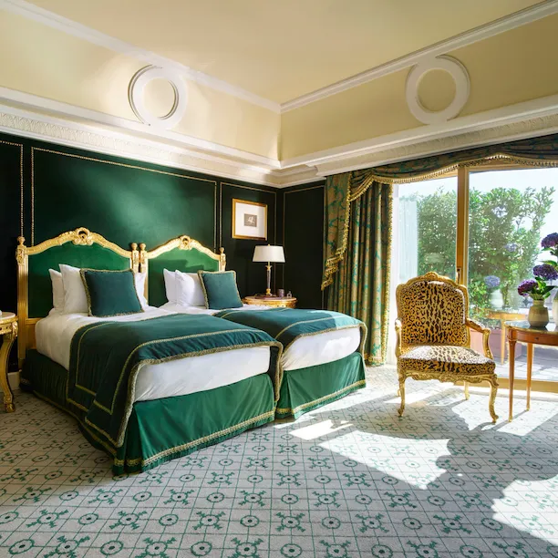 View of the first bedroom in green color in our Presidential Suite with a beautiful natural daylight