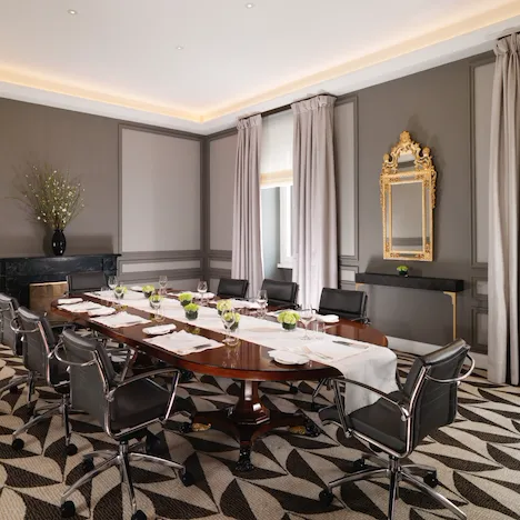 Sala Ludovisi boardroom with table set for private dining at Hotel Eden, Rome