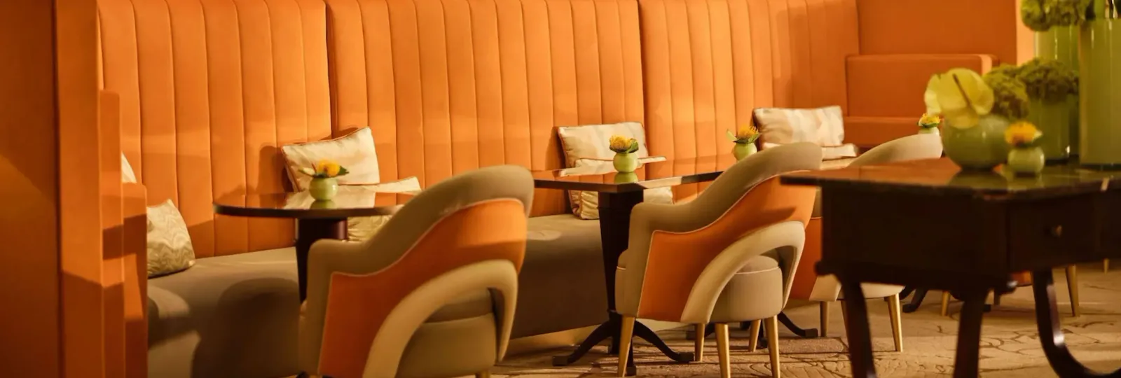 Il Salotto lobby lounge with black and white photographs hanging on the walls