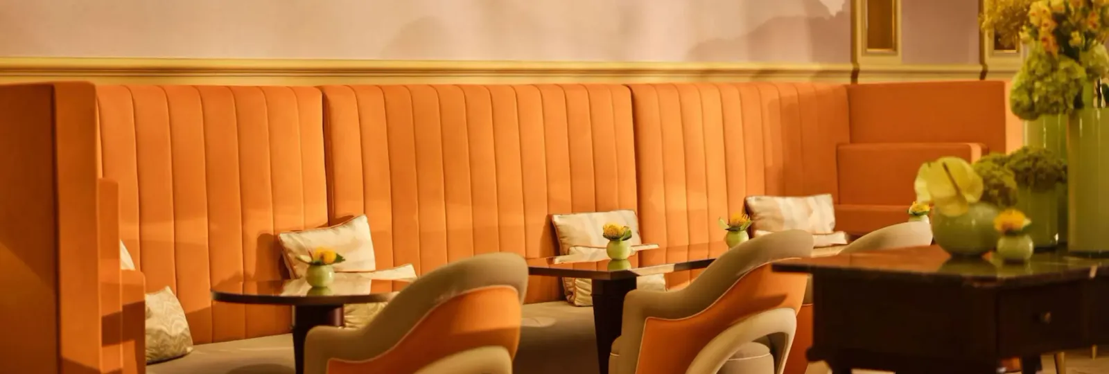 Il Salotto lobby lounge with black and white photographs hanging on the walls
