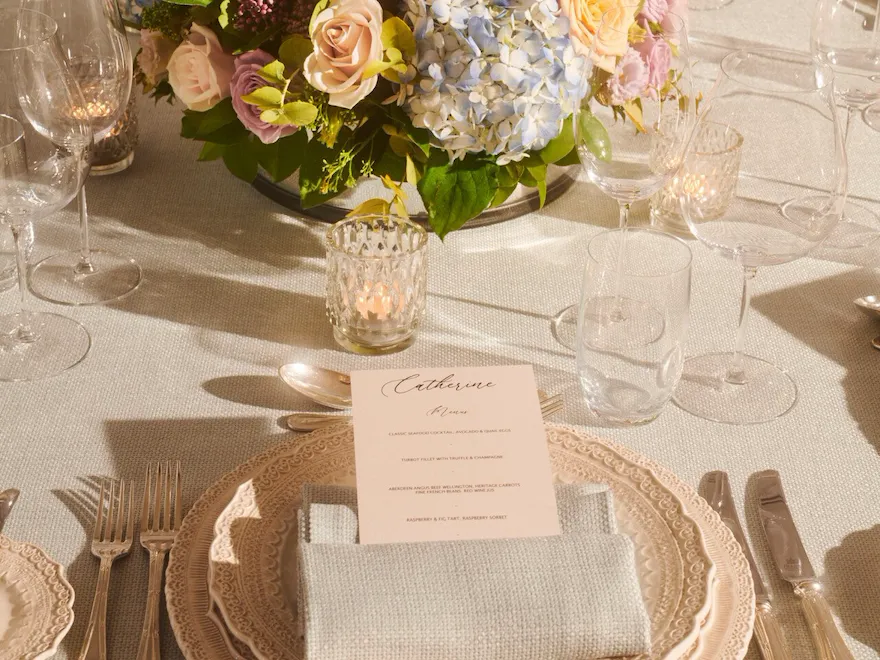 The Orchid set up for a stylish private dinner with bespoke menu details