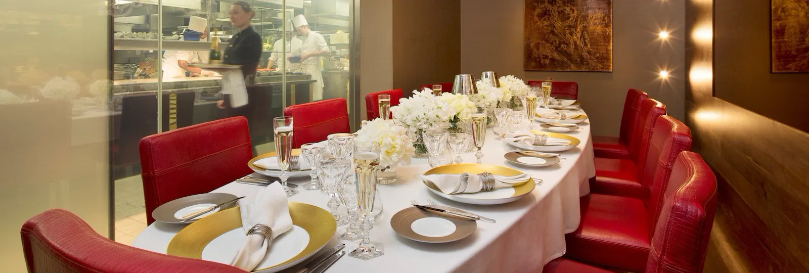 Chef's Table private dining, glass clear , dinner setup kitchen full view