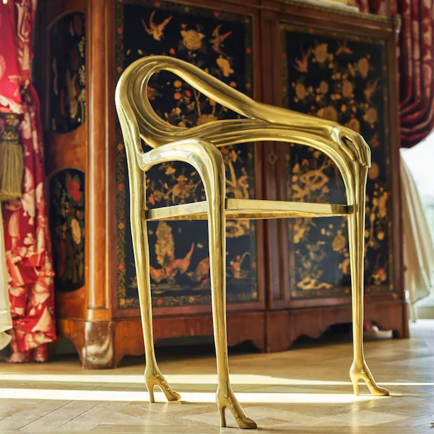 Gold chair and furniture in the Presidential appartment at le Meurice, Paris.
