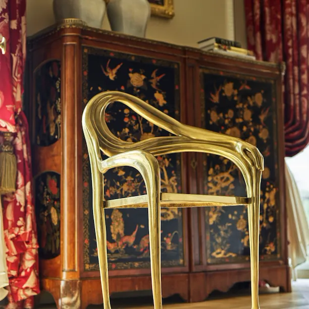 Gold chair and furniture in the Presidential appartment at le Meurice, Paris.