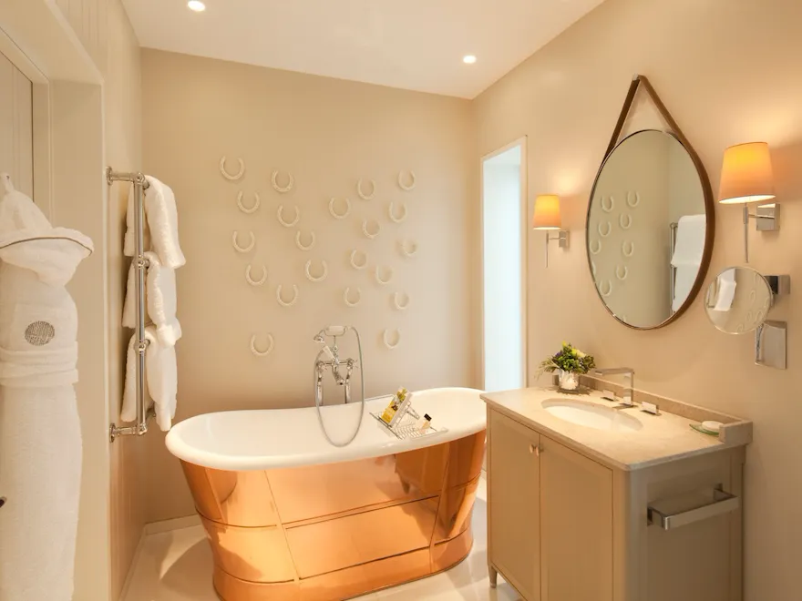 Stable Deluxe room bathroom interior at Coworth Park, Ascot