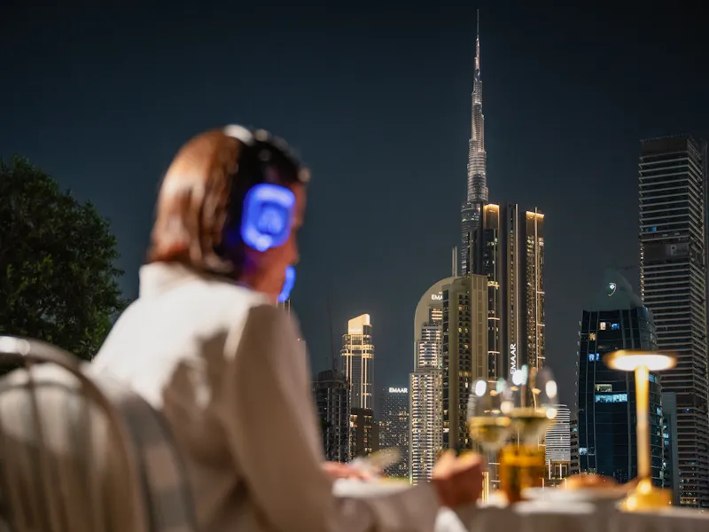 Guests enjoying the Riviera Cinema club experience with the views of Burj Khalifa in the back
