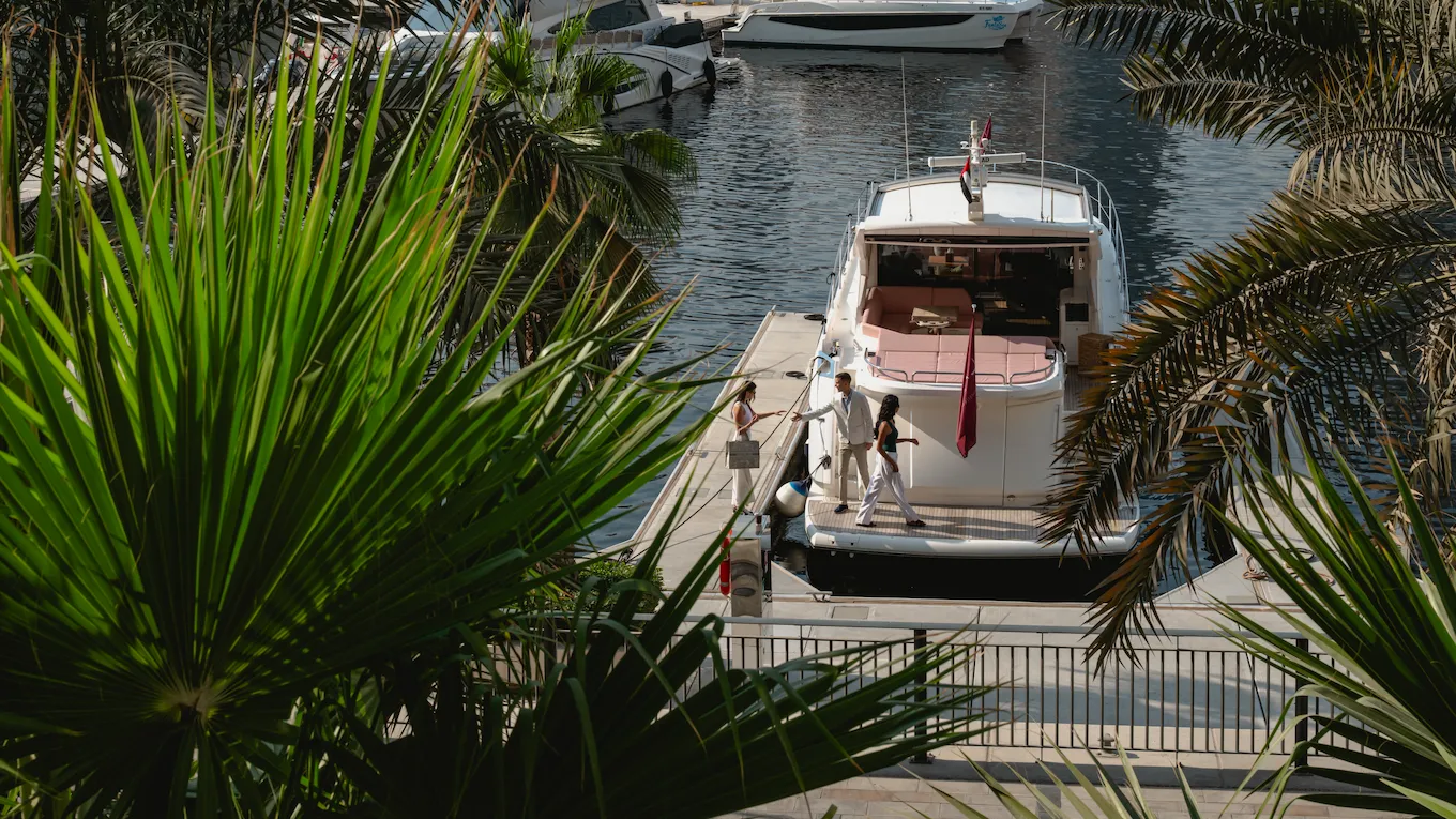 The Lana boat docked while guests are getting onboard