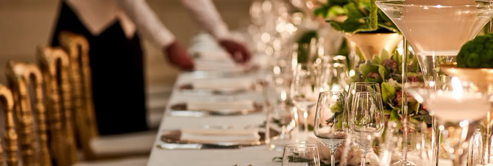 Cristalli Gala Room table set up for event with waiter arranging table at Hotel Principe Di Savoia, Milan