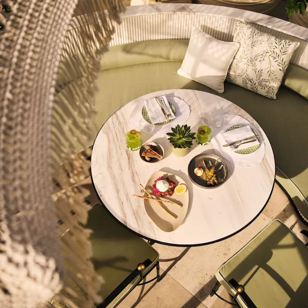 Image of Veranda design and food at The Lana - Dorchester Collection