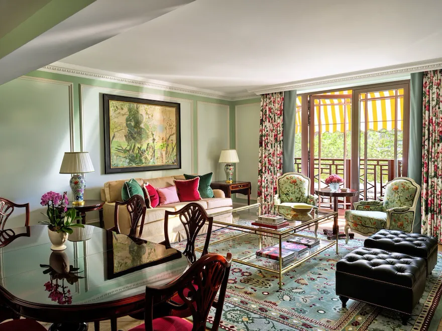 A bold and elegant room with comfortable seating and dining area